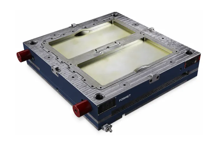 Injection mold for two rectangular trays with red cooling connectors