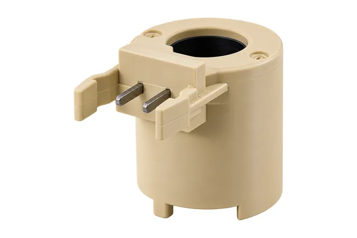 Beige molded coil housing with two metal terminal pins