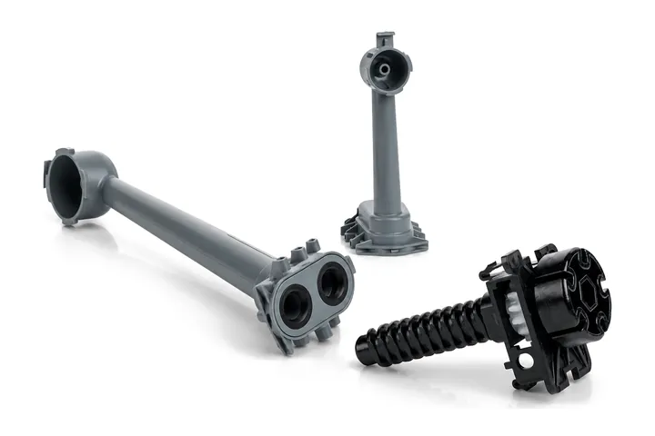 Gray molded spray arm tubes and a black threaded insert