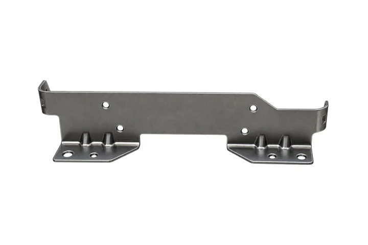 Stamped steel mounting bracket with formed flanges