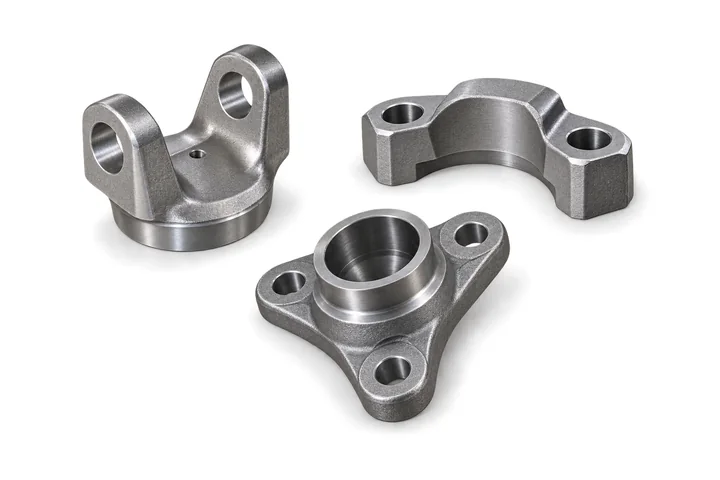 Forged steel yoke, flange and saddle clamp